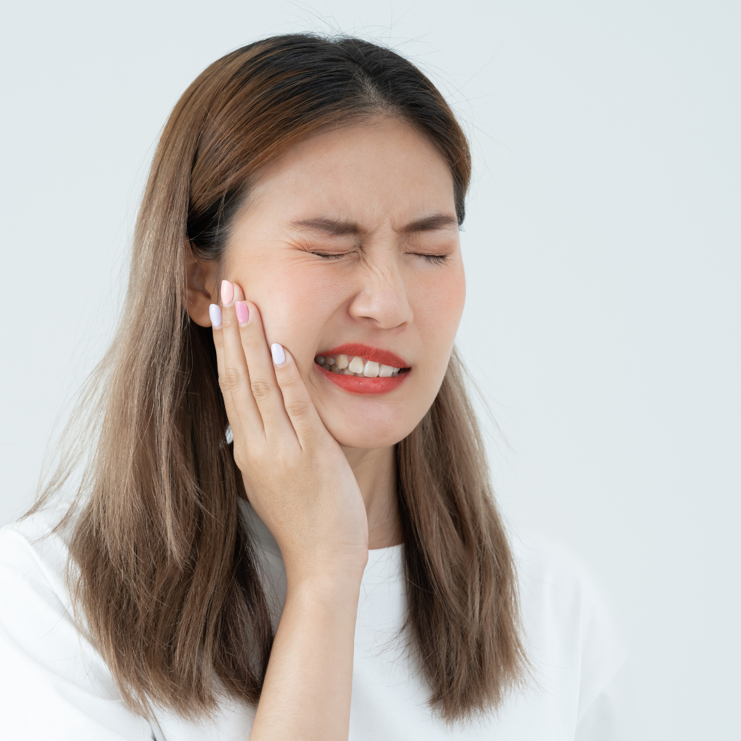 A woman with tooth pain